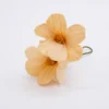 Fiore Primavera naturale e arancione per bomboniera