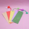 Segnalibro con cordino in cacca di carta di elefante conf. 10 pz
